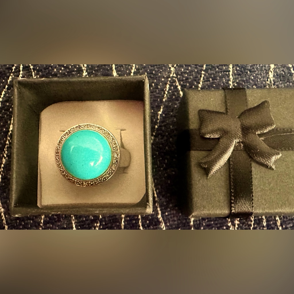 Sleeping Beauty Turquoise Ring With Crushed Pave Stones In Silver Metal.